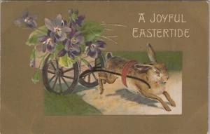 Postcard Easter Winsch Back Rabbit Pulls Flower Wagon c. 1910s Gold Foil - Picture 1 of 2