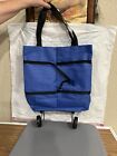 Blue cloth rolling shopping bag with handles