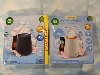 LOTE (2) KIT DE INICIO DIFUSOR DE NIEBLA ESENCIAL AIR WICK LINO Y PÉTALOS BLANCO Y NEGRO Foto 1 de 2