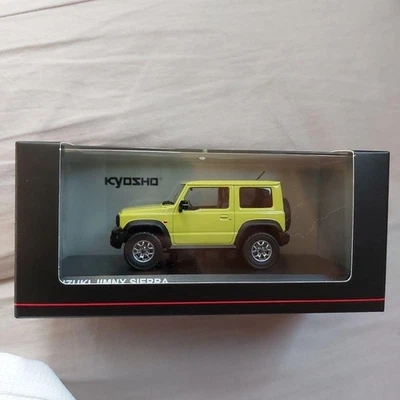 Kyosho 1/43 Suzuki Jimny Sierra Kinetic Yellow Diecast Model nuovo - Immagine 1 di 4