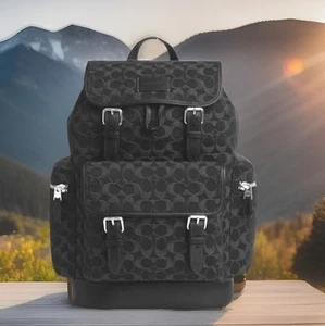 AUTÉNTICA NUEVA CON ETIQUETAS $750 Mochila de mezclilla Coach Sprint Signature para hombre en negro/plateado - Imagen 1 de 21