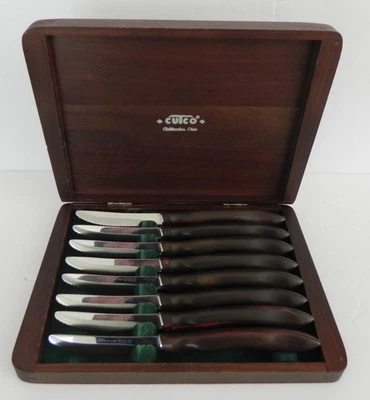 Juego de 8 cuchillos para carne dentados con mango giratorio CUTCO 1058 caja de presentación de madera Foto 1 de 4