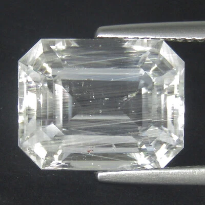 Gema de colección 10,88 quilates tremenda natural rara rutilo topacio blanco corte esmeralda Foto 1 de 4