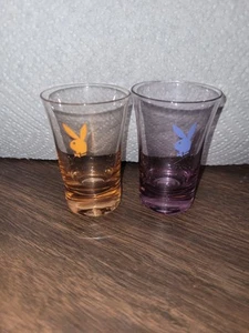 Playboy Bunny Shot Glass Souvenir Glass Vacation Lot of 2 Purple and Orange tint - Picture 1 of 2