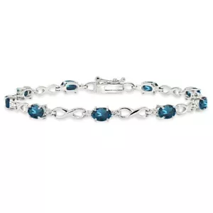 Oval London blauer Topas unendlich poliertes Sterlingsilber klassisches Tennisarmband - Bild 1 von 3