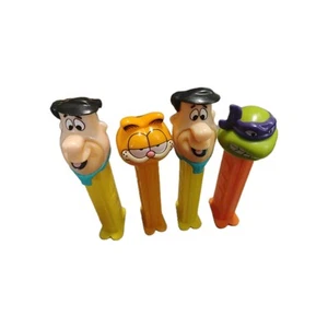 Fred Flintstone, Garfield, Donatello Ninja Turtle PEZ dispensers,Lot Of 4 Loose - Picture 1 of 21