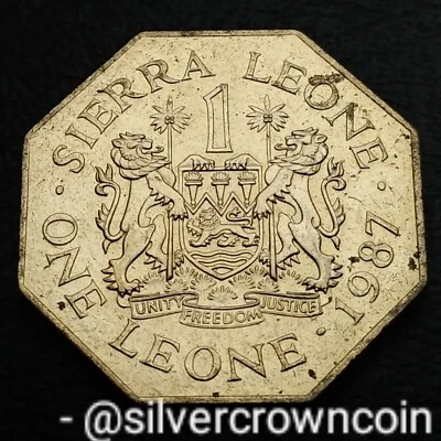 Sierra Leone 🇸🇱 1 Leone 1987. KM#43. Octagon One Dollar coin. President.  - Image 1 of 4