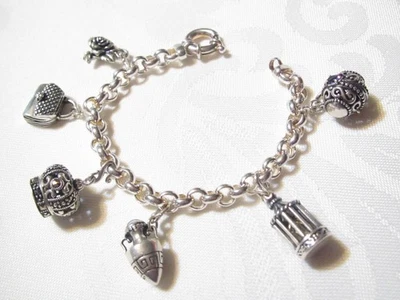 HERMOSA PULSERA ROLO 7 1/2" MILOR ITALIA ESTERLINA CON SEIS DIJES KABANA - 48G Foto 1 de 4