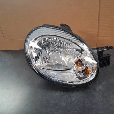 Faro halógeno con bisel cromado lado del pasajero para Dodge Neon 2003-2005 Foto 1 de 3