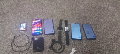 Lot of 5 Smartphones + 2 Smartwatches + Power Bank + Charging Cables Read Descr - Image 1 of 4