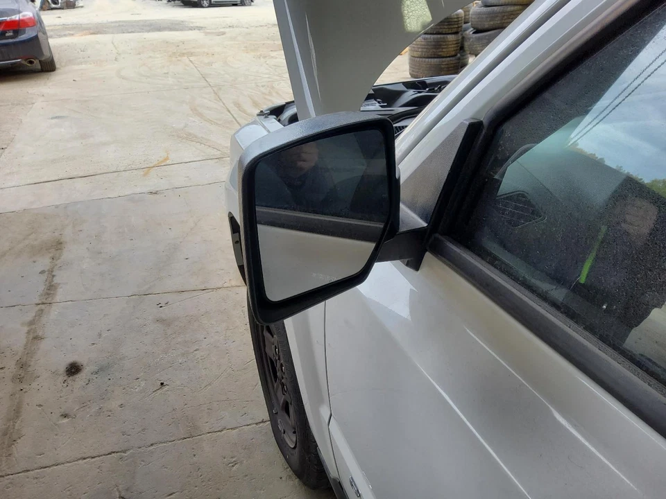 Used Left Door Mirror fits: 2012 Jeep Patriot moulded in black manual Left Grade - Image 1 of 4