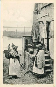 PRINTED POSTCARD OF GOSSIP ON NEWLYN BEACH, (NEAR PENZANCE), CORNWALL - Picture 1 of 2