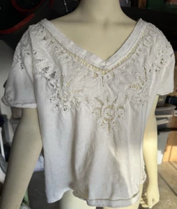 Free People Kate top all'uncinetto taglia media beige scollo a V orlo esposto manica a polsino - Foto 1 di 8