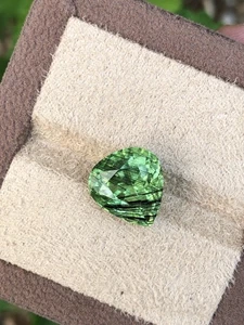 10.25 Carat Trillion Cut Pakistani Peridot With Ludwigite Inclusions For Jewelry - Picture 1 of 8
