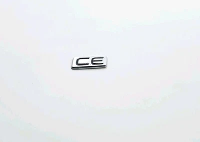 2003-2013 TOYOTA COROLLA CE REAR LID EMBLEM BADGE OEM - Image 1 of 3
