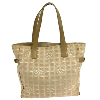 BOLSO DE MANO CHANEL BEIGE JACQUARD NYLON LÍNEA DE VIAJE NQ02311 BN02 Foto 1 de 4