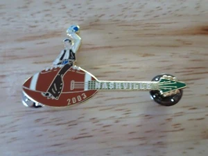 Hard Rock Cafe pin Nashville Cowboy Riding A Football Guitar 2003 - Picture 1 of 1