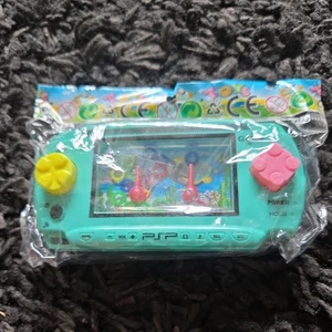 Children's Handheld Water Game, CLASSIC GAME. NEW AND SEALED. Colour Green - Picture 1 of 2