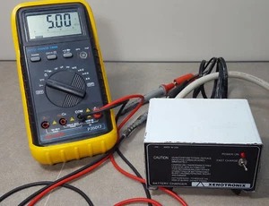 Xenotronix Model 8102E1220AN Battery Charger, Output 5Vdc. Tested with 120Vac. - Picture 1 of 6