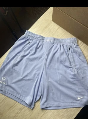 [DV3651-479] PANTALONES CORTOS NIKE X NOCTA NRG PARA HOMBRE 'COBALT BLISS/BLANCO' Foto 1 de 3
