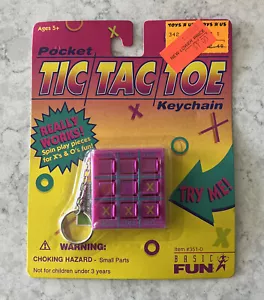 Llavero minijuego Tic Tac punta púrpura de Basic Fun 1996 sellado de fábrica juguetes R EE. UU. - Imagen 1 de 7