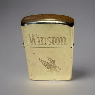 Encendedor abatible Winston Firebird de latón hecho en Corea Foto 1 de 4