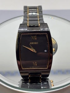 Reloj Pulsera Seiko Hombre Vintage Dos Tonos Negro y Dorado Vestido Cuarzo Batería Nueva - Imagen 1 de 9