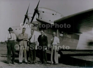 1934 Sir Charles Kingsford Smith Posing w/New Plane Press Photo - Picture 1 of 2