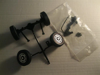 ERTL66  Pontiac GTO  Parts 1:18 Scale Wheels Tires Suspension Set - Image 1 of 4