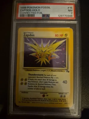 1999 POKEMON FOSSIL #15 ZAPDOS-HOLO CORRECTED FOIL PSA 7 - Image 1 of 3