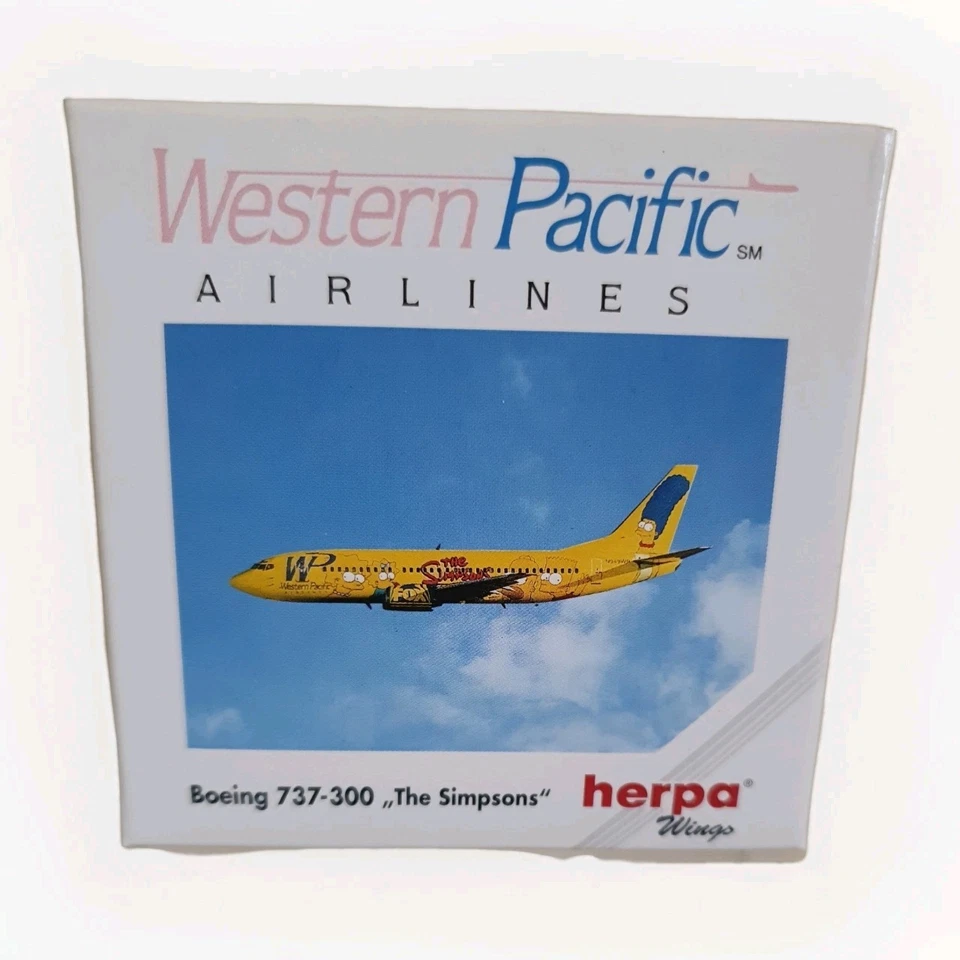 lHERPA WINGS 500470  BOEING 737-300  THE SIMPSONS 1:500 SCALE DIECAST PLANE MIB  - Image 1 of 4