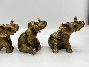 Pequeñas estatuillas de elefante acabado bronce - Imagen 1 de 8