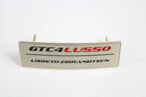 2016-2020 Ferrari GTC4 Lusso OEM Side Sill Badge Script Emblem - Picture 1 of 3