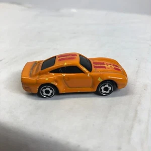 Coche de juguete diecast vintage Hot Wheels 1987 Porsche 959 rayas rojas naranja - Imagen 1 de 6
