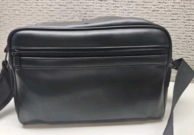 Estuche para cámara negro con correa suave 3 compartimentos sin marca  Foto 1 de 4