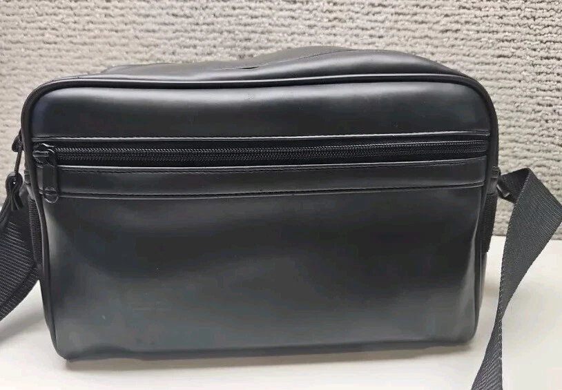 Estuche para cámara negro con correa suave 3 compartimentos sin marca  Foto 1 de 4