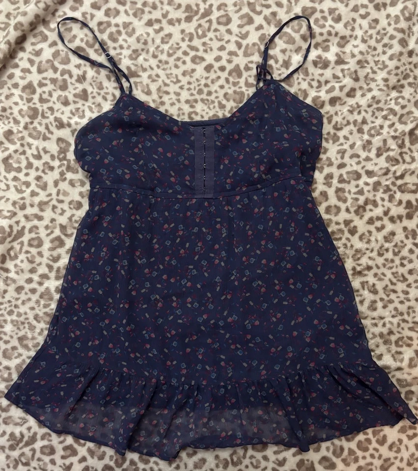 Camiseta sin mangas vintage Y2K American Eagle cuello en V floral babydoll S azul oscuro gasa Foto 1 de 4