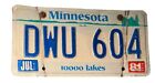 Vintage Minnesota License Plate July 1981 DWU604 White Tag Blue Embossed Letters