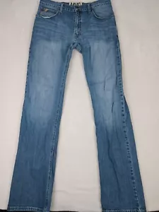 Pantalones de mezclilla Ariat M4 Bootcut para hombre 34x38 (35x37) lavado medio tiro bajo Freeman - Imagen 1 de 15