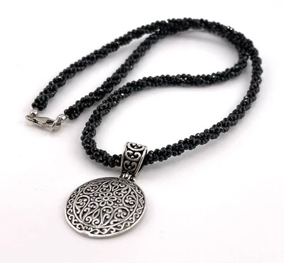 ESTATE-BLACK WOVEN SPINAL NECKLACE 20” w/925 Sterling Silver Round Pendant. Exc - Image 1 of 4