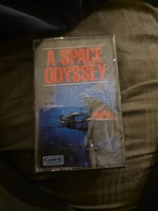 1988 A SPACE ODYSSEY CASSETTE TAPE SEALED NEW SCIENCE-FICTION THEME SONGS... - Bild 1 von 3