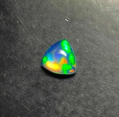 Piedra preciosa suelta de billón de cabujón de ópalo etíope natural de buena calidad 7 mm Foto 1 de 4