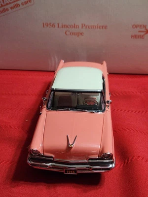 Danbury Mint 1956 Lincoln Premiere Coupe, Coral Pink, 1:24, - Image 1 of 4