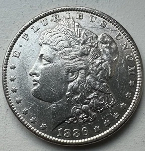 1886 Morgan Silver Dollar - INV#7838 - Picture 1 of 2