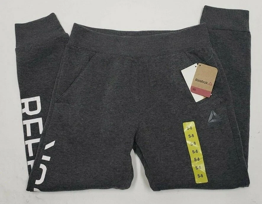 Pantalones deportivos para correr Reebok de ajuste regular gris pequeño 8 para niños Foto 1 de 4