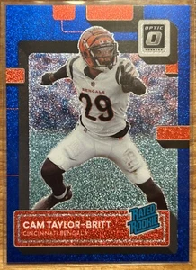 2022 Donruss Optic - Cam Taylor-Britt - Rated Rookie - Blue Glitter Prizm SSP - Picture 1 of 2