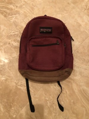 Mochila Escolar Vintage Retro Distress Jansport Parte Inferior de Cuero Rojo y Marrón Foto 1 de 4