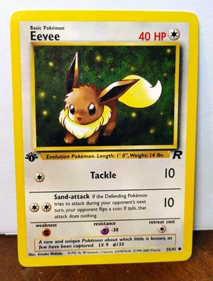 POKEMON EEVEE 55/82 1ST EDITION TEAM ROCKET MP-LP - Image 1 of 4