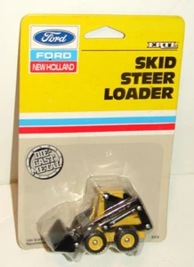 Vintage 1987 ERTL Diecast FORD New Holland SKID LOADER *MOC* NRFP - Picture 1 of 3