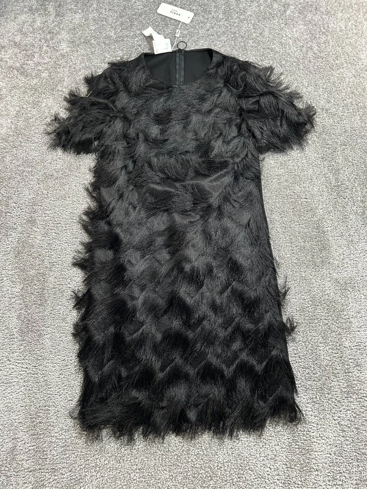 Vestido Akris para mujer 6 negro con flecos de piel sintética nuevo Foto 1 de 4